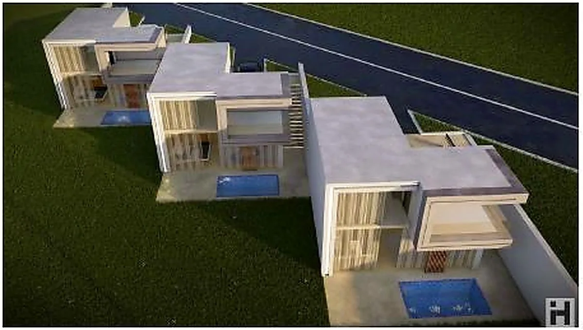 Aerial view of low chalet units stepped along a plot with private pools.