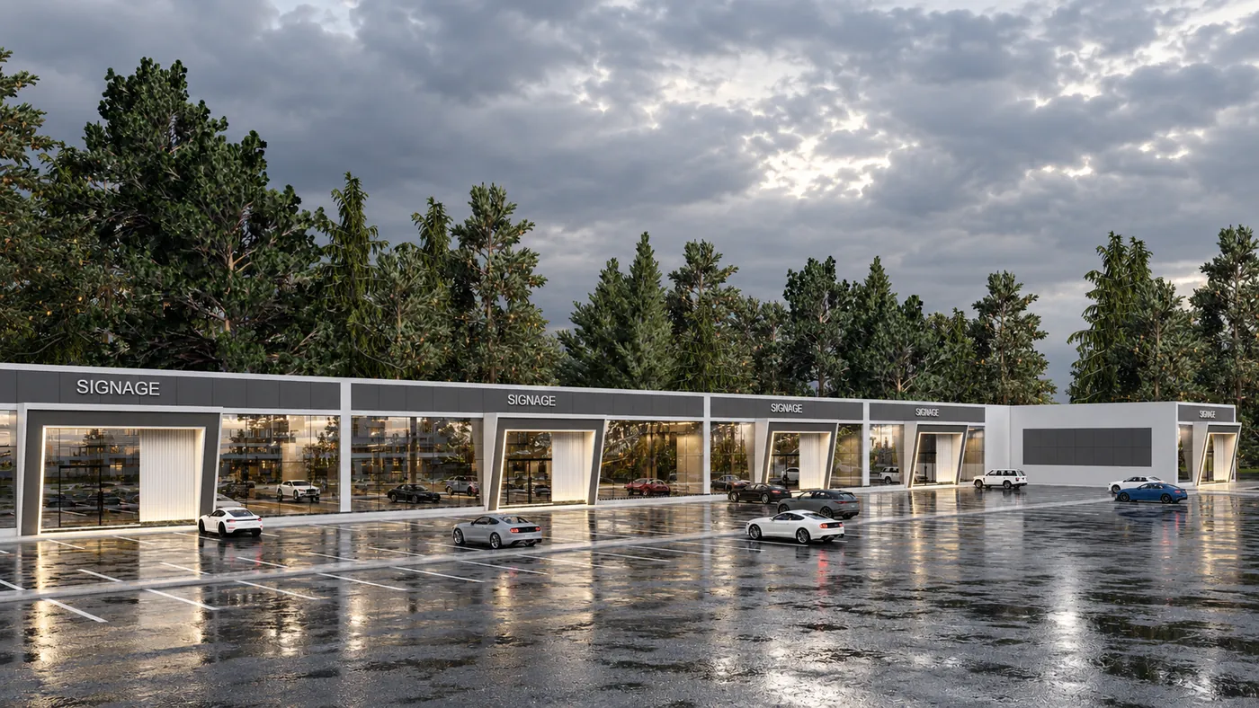 Wide view across the parking to the full length of the retail parade.