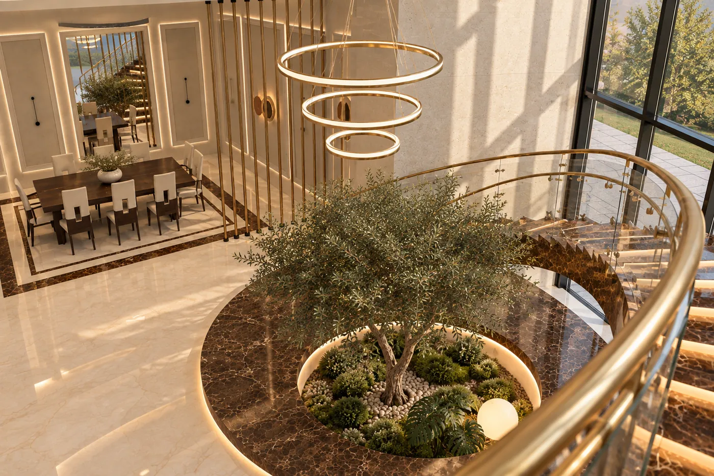 View down from the stair onto the olive tree, its round marble planter and the dining room beyond.