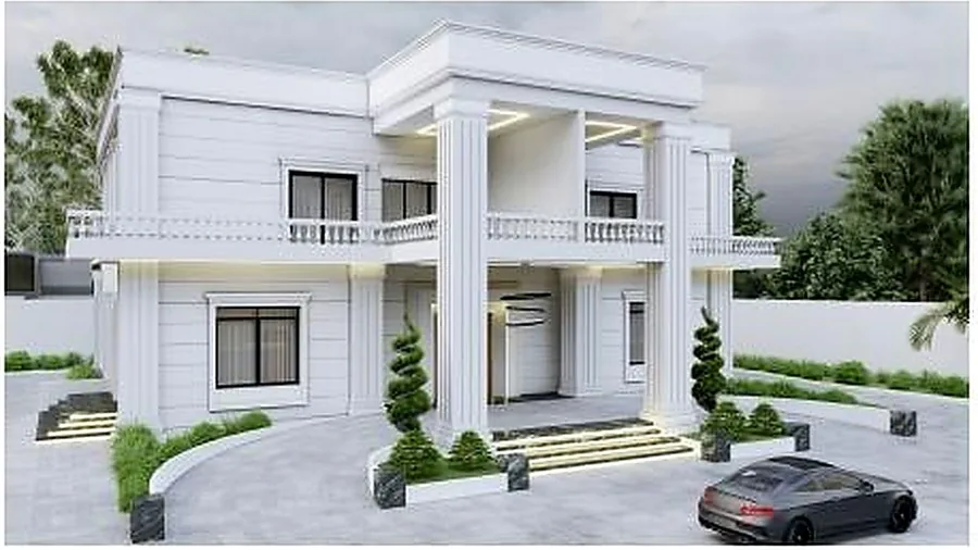 The classical villa from the street behind a railing wall and clipped planting.
